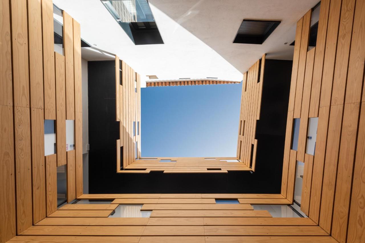 Komodo Puerta Osario Seville Exterior photo